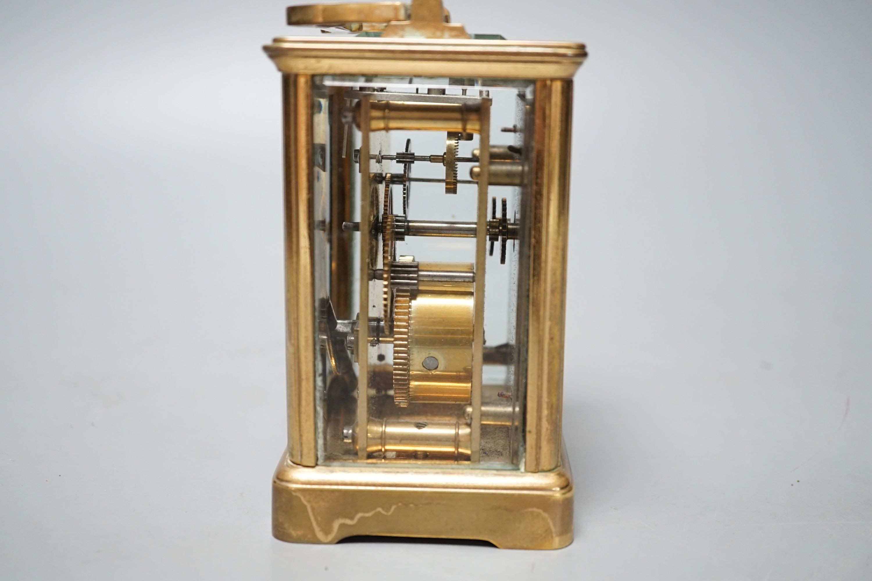A brass cased French eight day carriage timepiece, 12cm high with key. *This lot is being sold in aid of the charity Prostate Cancer UK with 100% of the hammer price going to the charity”